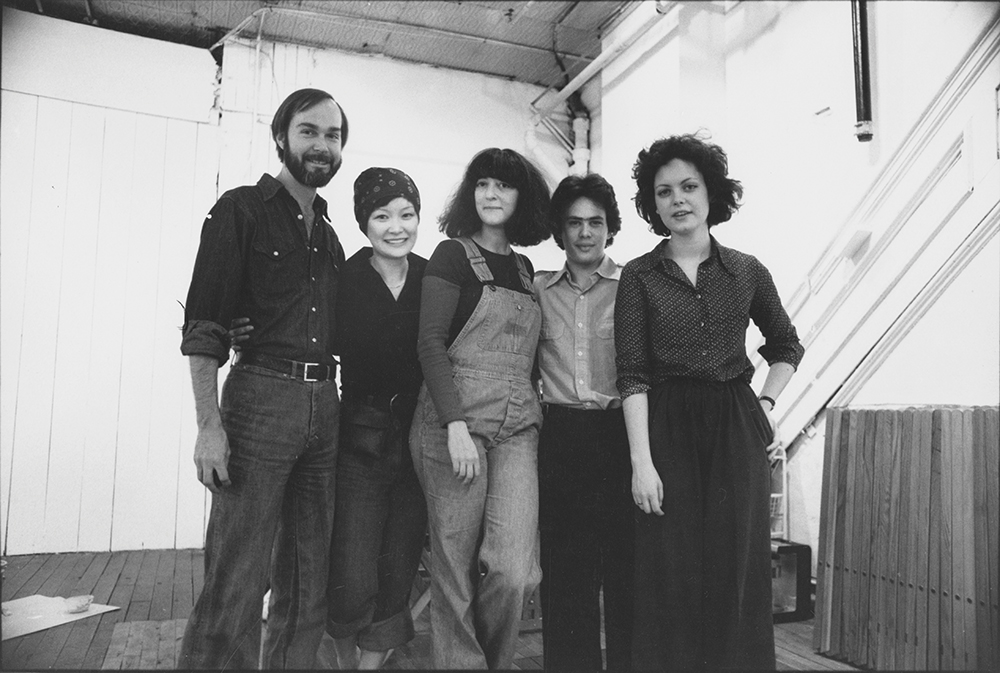 Tucker (center) with New Museum staff, September 1977. Left to right, A.C. Bryson, Michiko Miyamoto, Tucker, Allan Schwartzman, and Susan Logan.