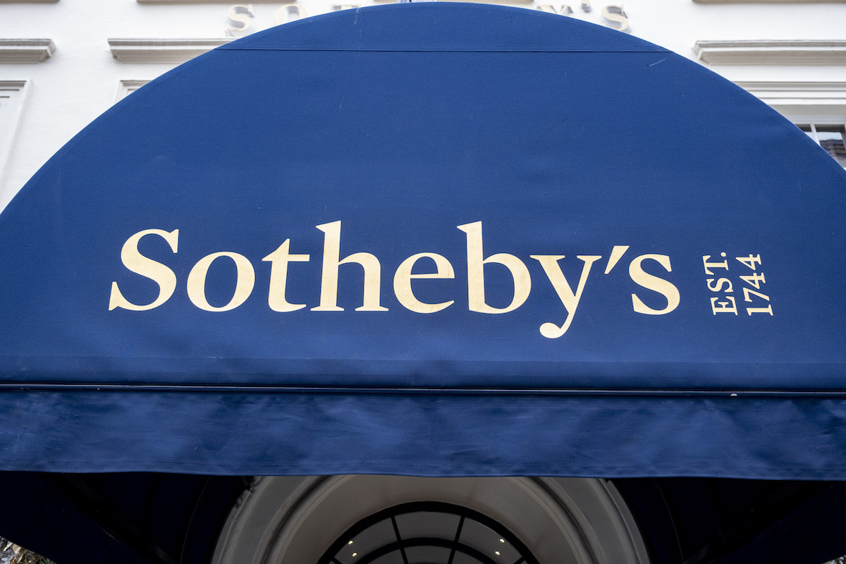 A blue awning that reads 'SOTHEBY'S EST. 1744.'